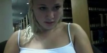Sexy blonde rubs tits on webcam