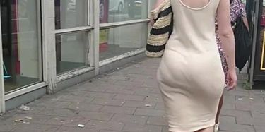 Alluring ebony ass caught on street candid cam